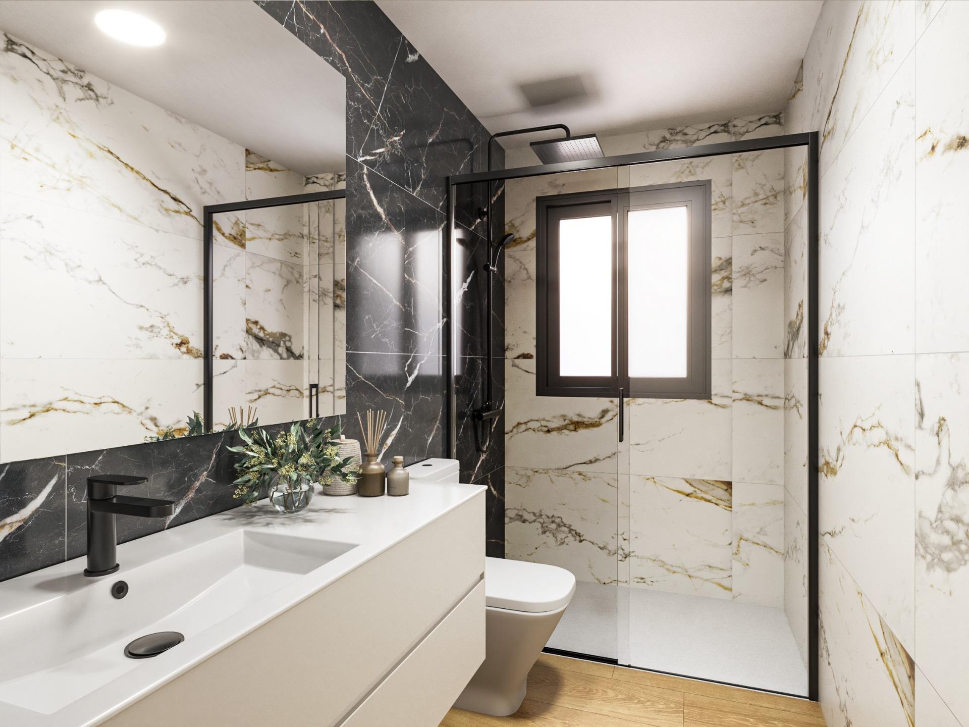 Elegant bathroom with modern fixtures and marble accents in exclusive 2 bedroom penthouse with private solarium, Torrevieja.