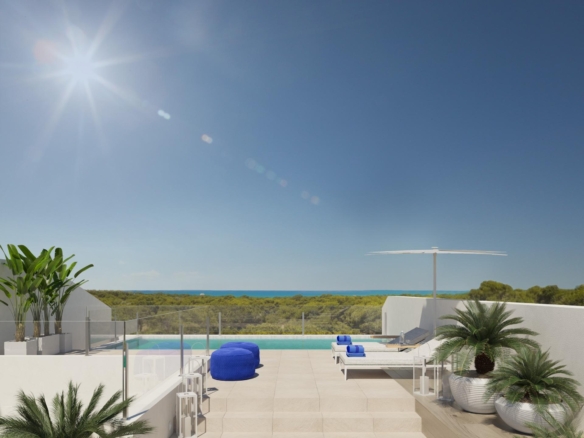Sun-drenched communal pool and sleek terrace with sea views at spacious 4-bedroom ground floor apartment in Guardamar del Segura