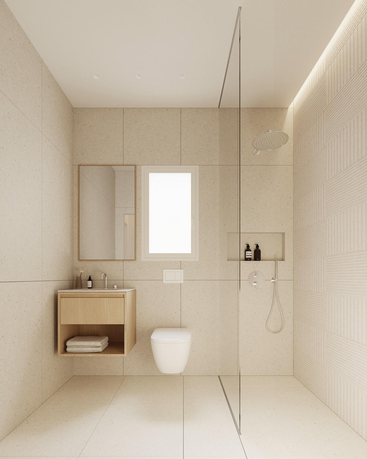 Bright, modern bathroom with walk-in shower and sleek fixtures in spacious new build 2-bedroom apartment in central Torrevieja.