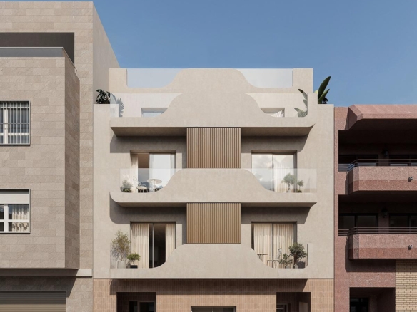 Elegant modern façade of a spacious new build 2-bedroom apartment in central Torrevieja, showcasing stylish balconies and clean lines.
