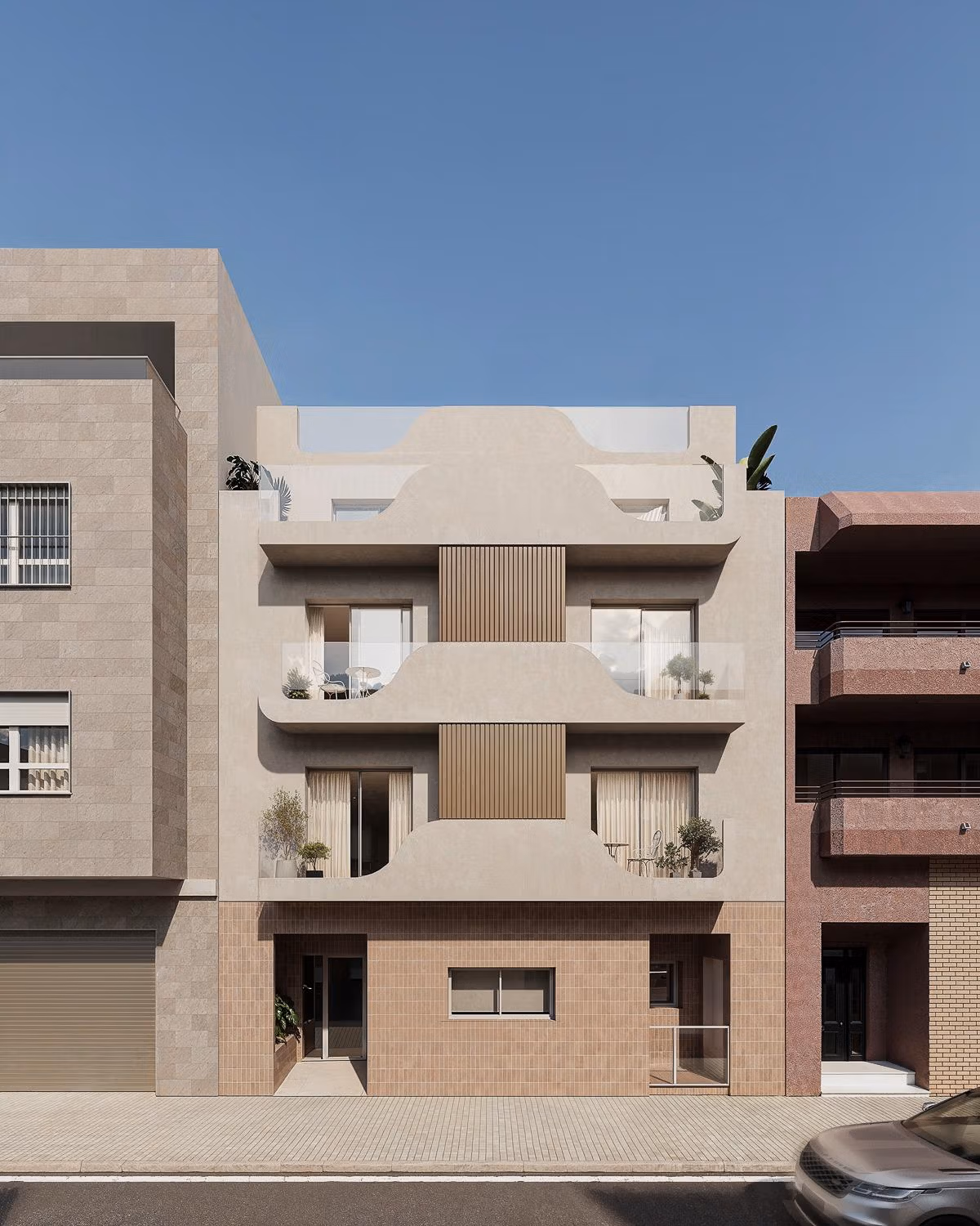 Elegancka nowoczesna elewacja przestronnego nowego apartamentu z 2 sypialniami w centrum Torrevieja, stylowymi balkonami i czystymi liniami.