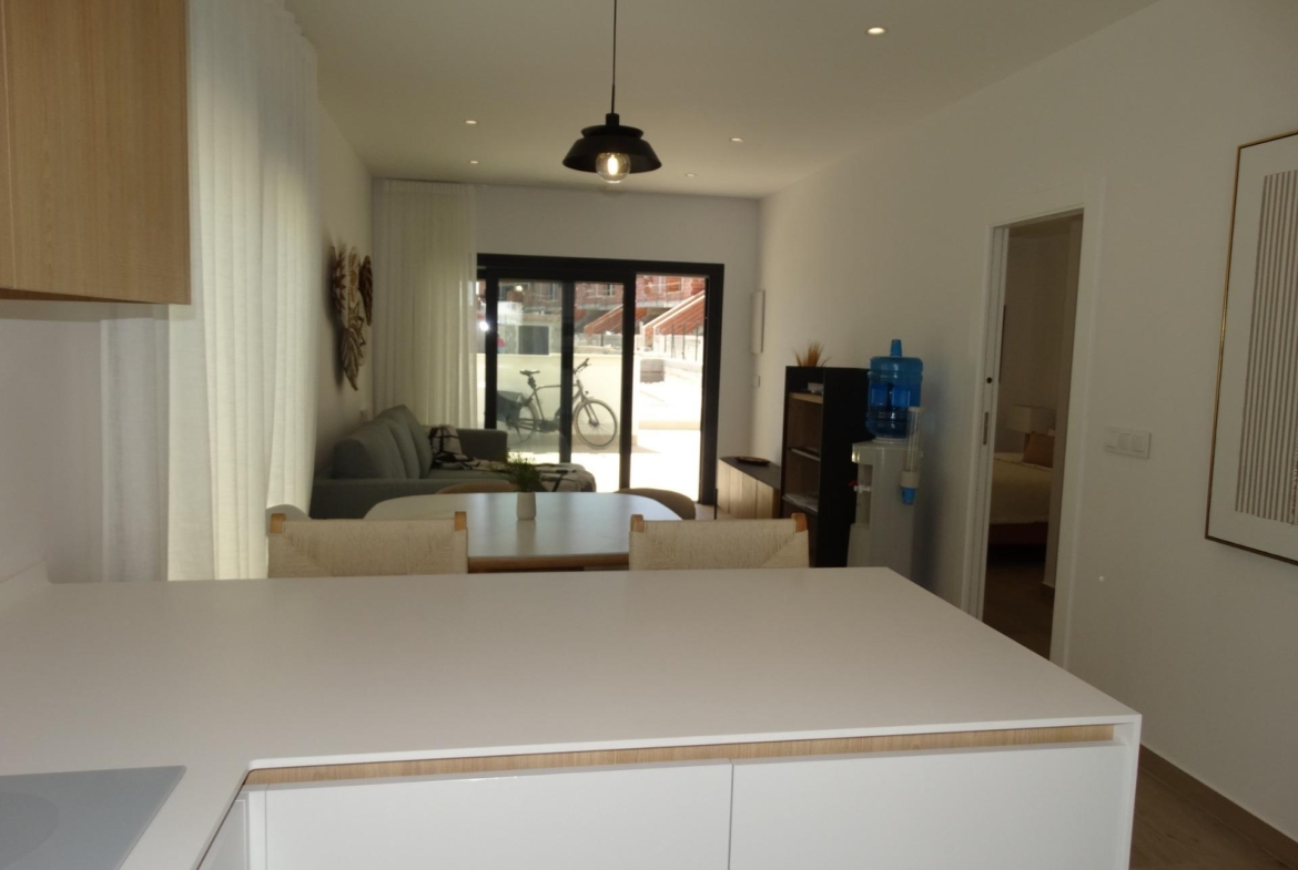Modern-New-Build-Bungalows-for-Sale-in-Pilar-de-la-Horadada-10 Bright open-plan living and dining area in modern new build bungalow for sale in Pilar de la Horadada