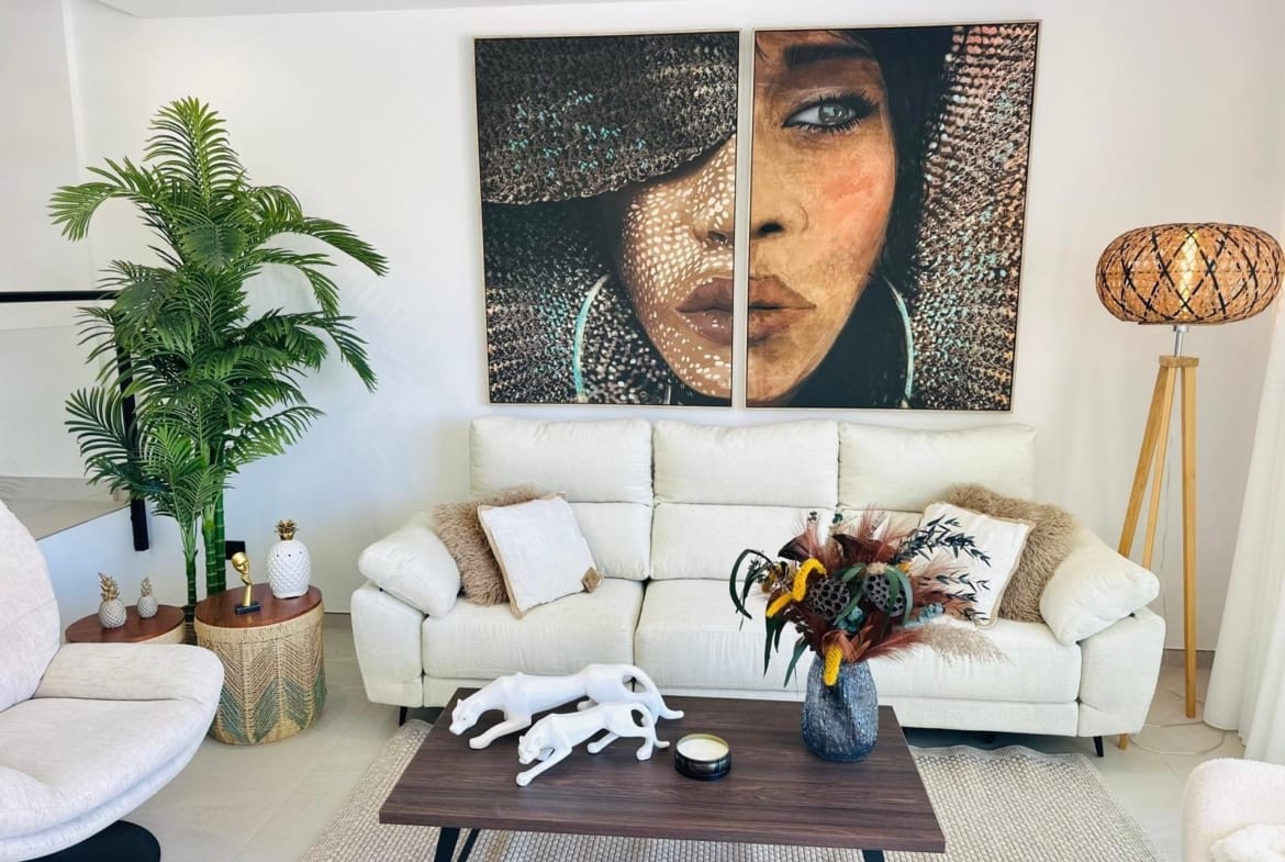 Bright and elegant living room in a luxury new build villa in San Pedro del Pinatar with modern art and cozy seating.