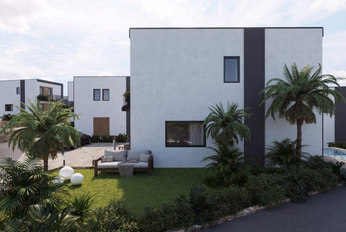Modern-New-Build-Villas-in-Finestrat-with-Private-Pool-Near-Benidorm-11 Modern energy-efficient 3 bedroom villa in Finestrat, Benidorm with lush landscaped garden and private outdoor seating area.