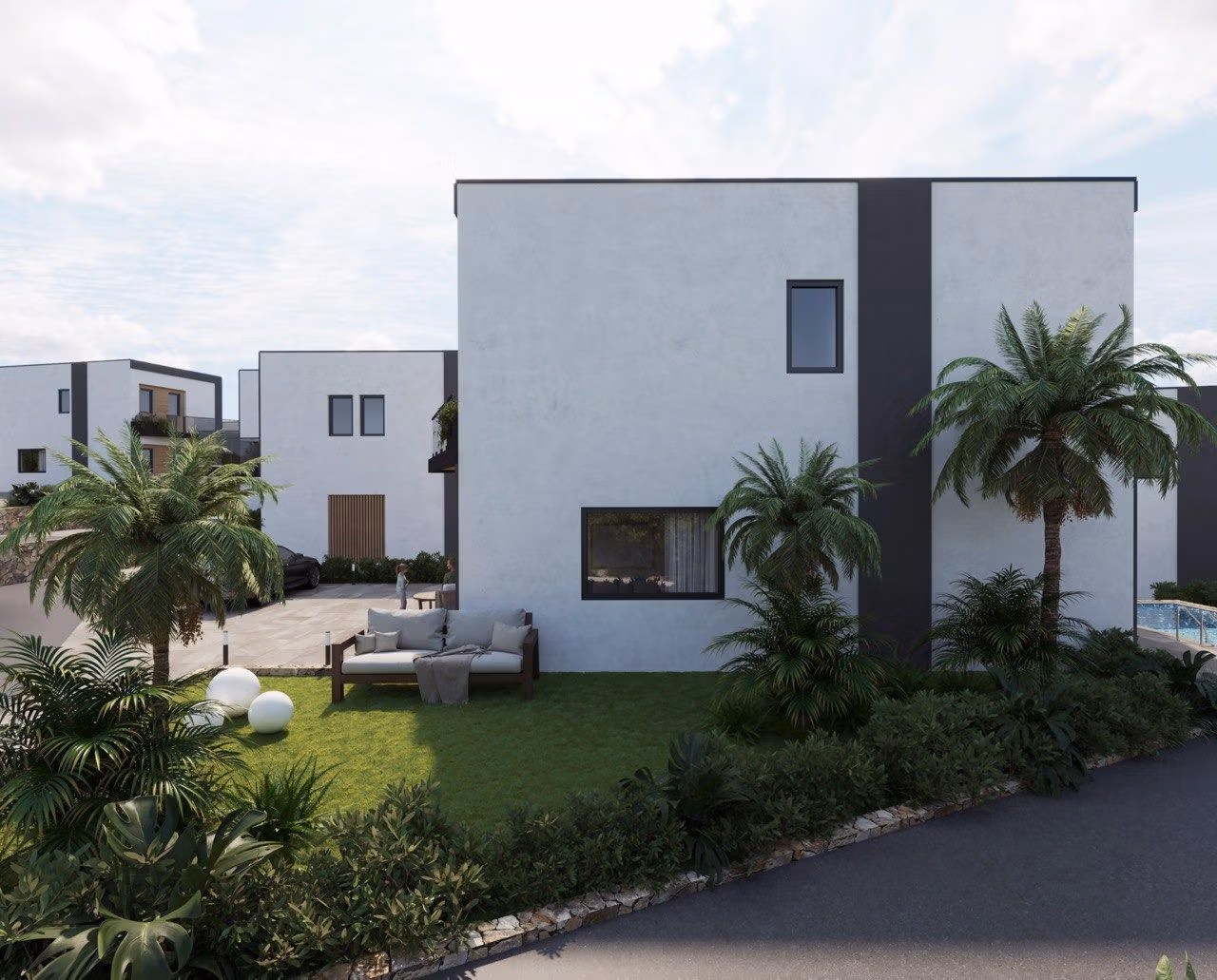 Modern-New-Build-Villas-in-Finestrat-with-Private-Pool-Near-Benidorm-11 Modern energy-efficient 3 bedroom villa in Finestrat, Benidorm with lush landscaped garden and private outdoor seating area.