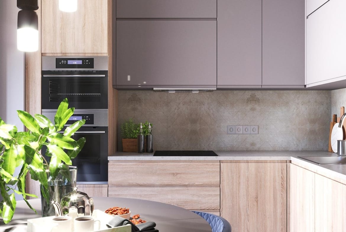 Bright modern kitchen with sleek cabinetry and dining area in energy-efficient 3-bedroom villa in Finestrat, Benidorm