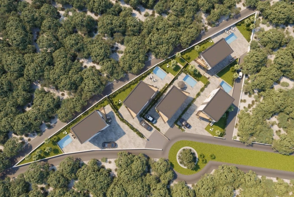 Modern-New-Build-Villas-in-Finestrat-with-Private-Pool-Near-Benidorm-2 Aerial view of modern, energy-efficient 3-bedroom villas in Finestrat, each with landscaped gardens and private pools nestled in lush greenery.