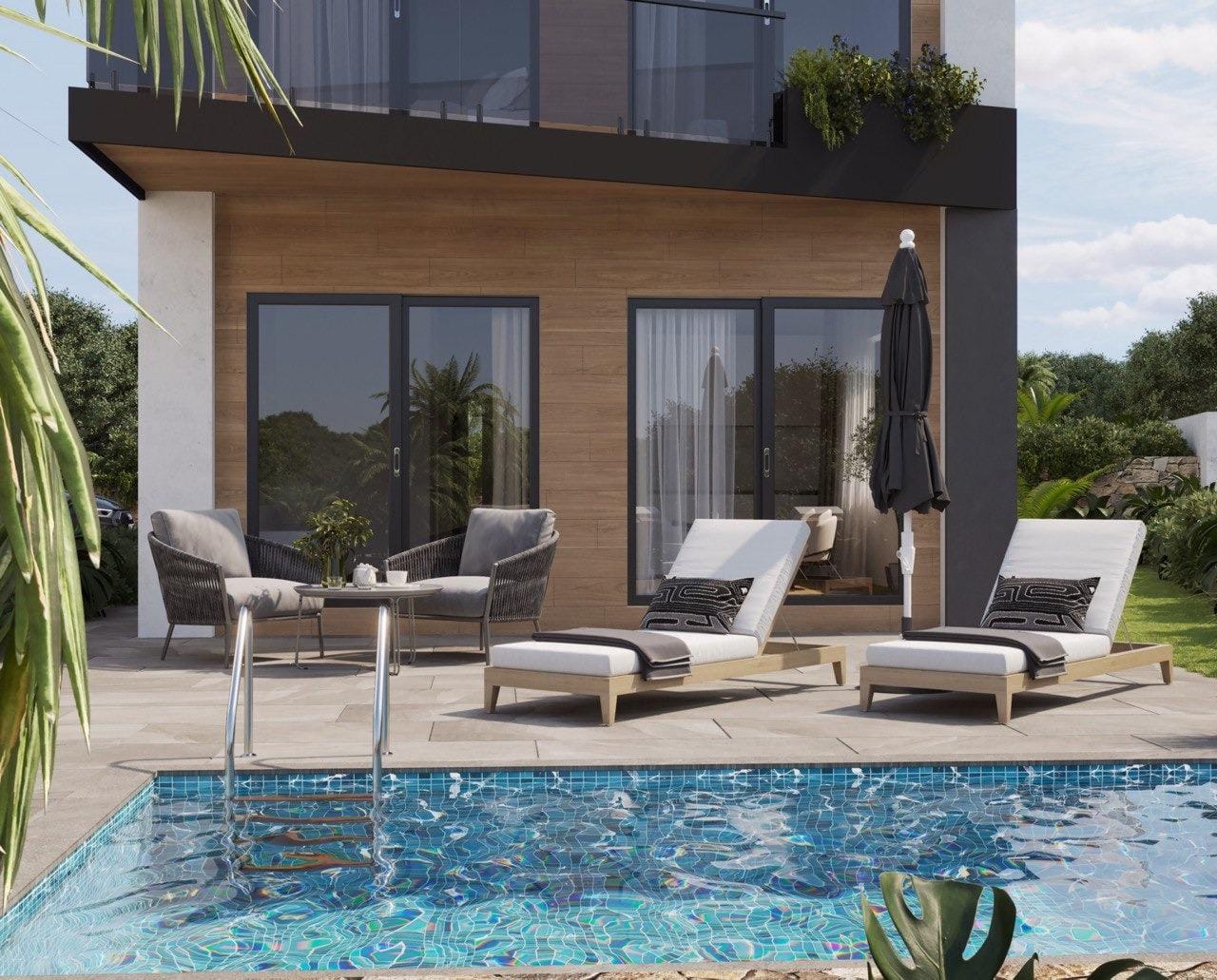 Modern-New-Build-Villas-in-Finestrat-with-Private-Pool-Near-Benidorm-3 Sun-drenched terrace with modern loungers and a sparkling private pool at an energy-efficient 3-bedroom villa in Finestrat, Benidorm.