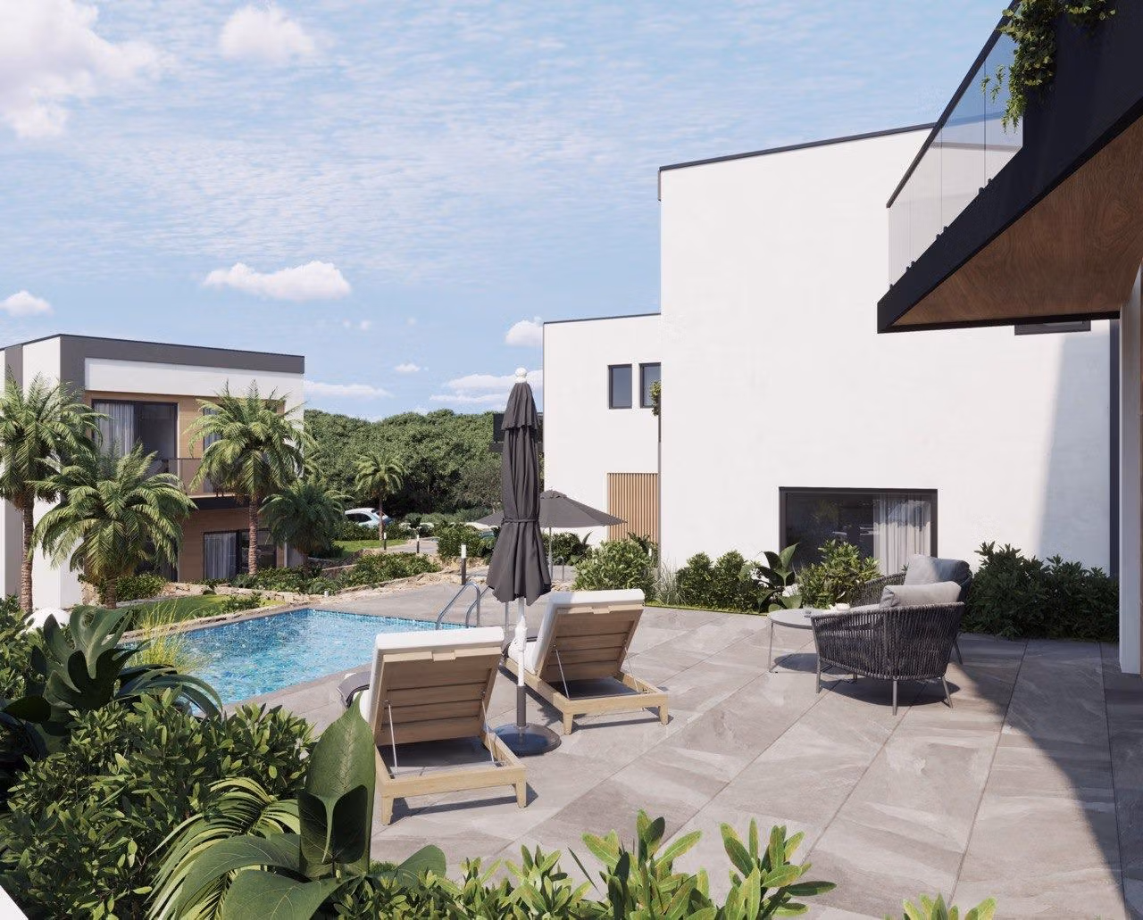 Modern-New-Build-Villas-in-Finestrat-with-Private-Pool-Near-Benidorm-6 Spacious sunlit terrace with modern outdoor seating and private pool at energy-efficient 3-bedroom villa in Finestrat, Benidorm.