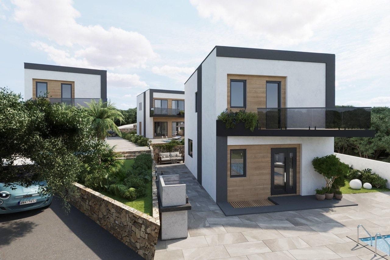 Modern-New-Build-Villas-in-Finestrat-with-Private-Pool-Near-Benidorm-7 Modern energy-efficient 3-bedroom villa with sleek facade, balcony, and lush landscaping in sunlit Finestrat, Benidorm.