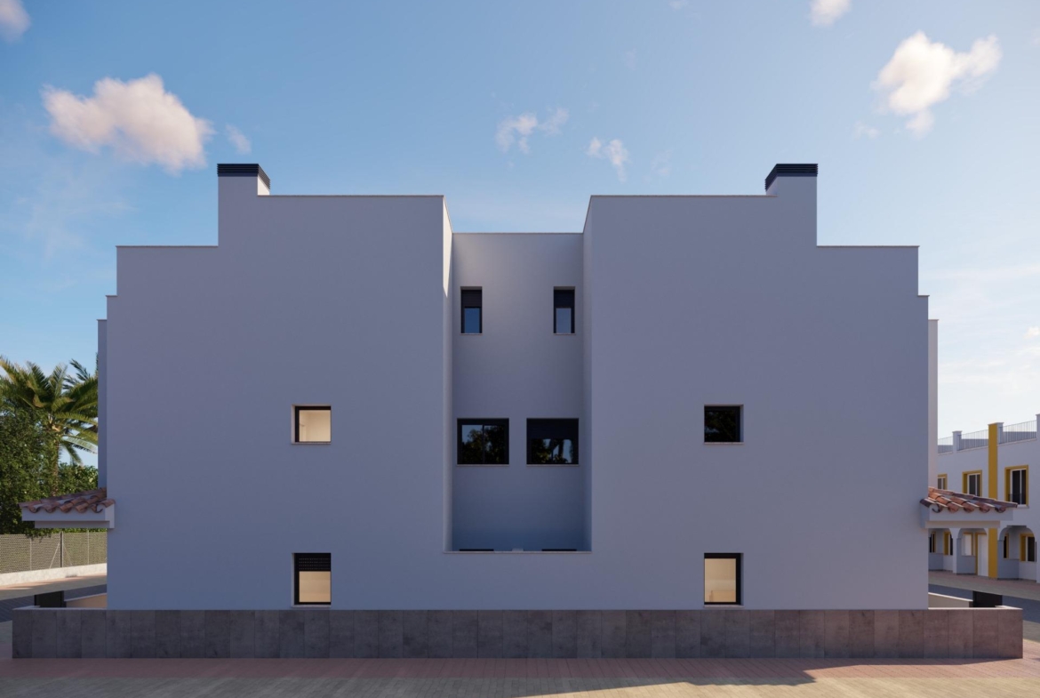 Modern and stylish 2-bedroom townhouse exterior in Santa Rosalía, Torre Pacheco with sleek lines and pristine white facade under clear skies.