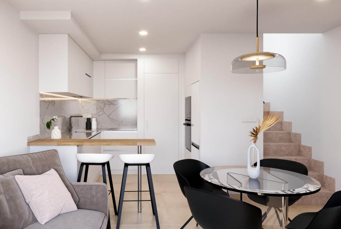 Bright modern open-plan kitchen and dining area in stylish 2 bedroom townhouse in Santa Rosalía, Torre Pacheco with elegant finishes