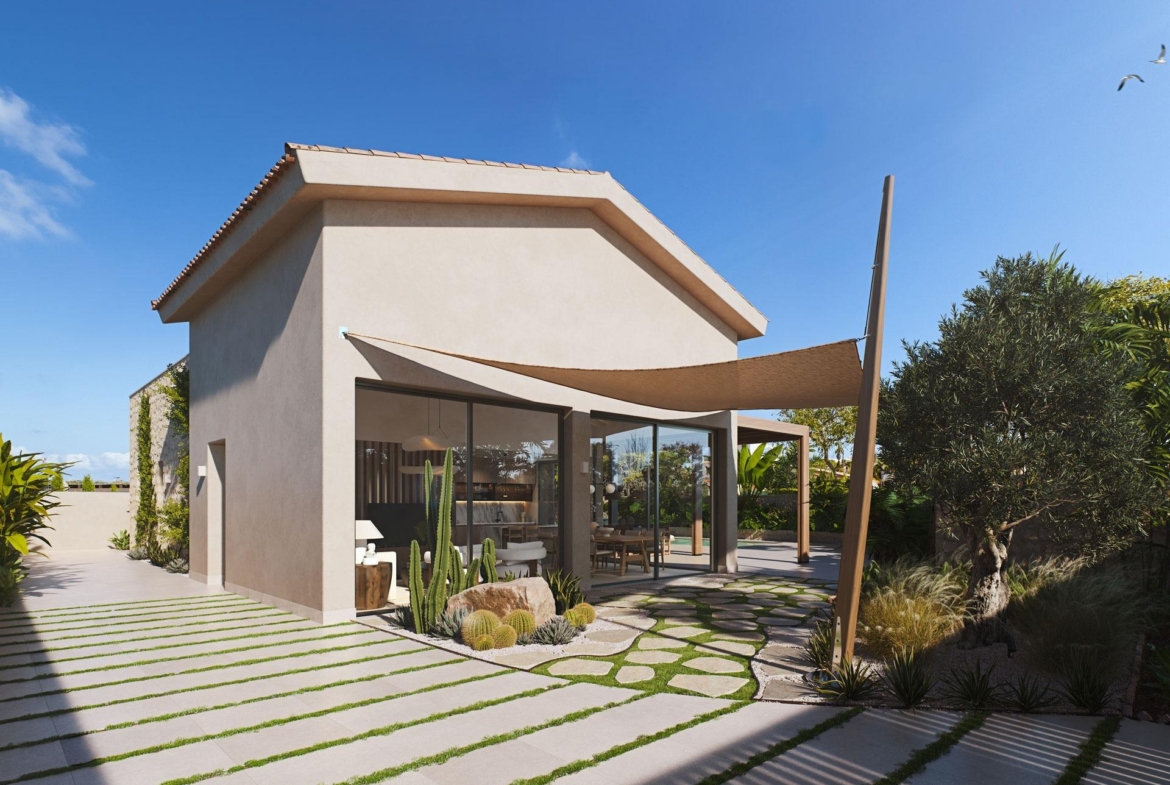 Elegant modern villa exterior in Cabo de Palos with sun-drenched terrace and minimalist landscaped garden just 150 meters from the beach