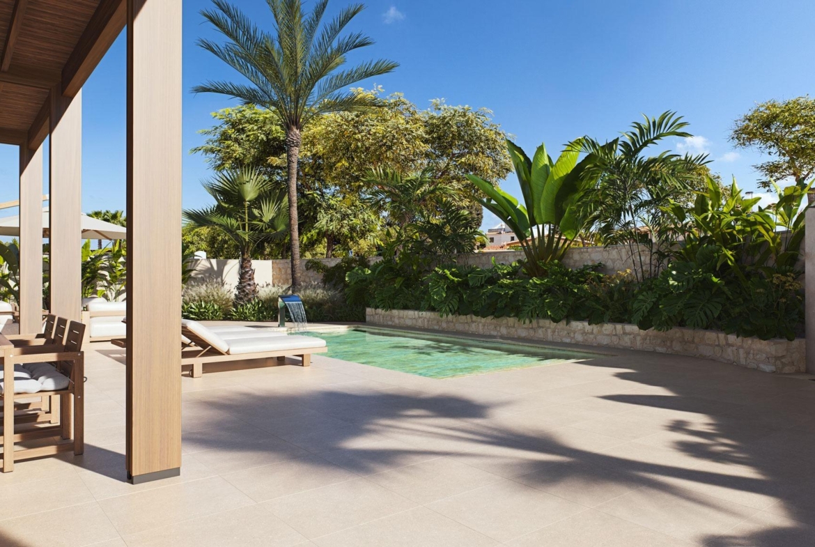 Sun-drenched modern villa terrace with private pool and lush landscaping in Cabo de Palos, Costa Cálida
