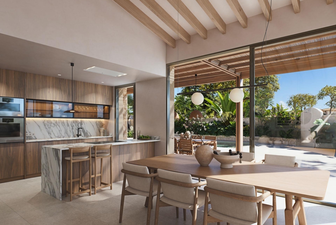 Sun-drenched modern villa dining area and sleek kitchen with marble island, open to a lush terrace in Cabo de Palos, Costa Cálida.
