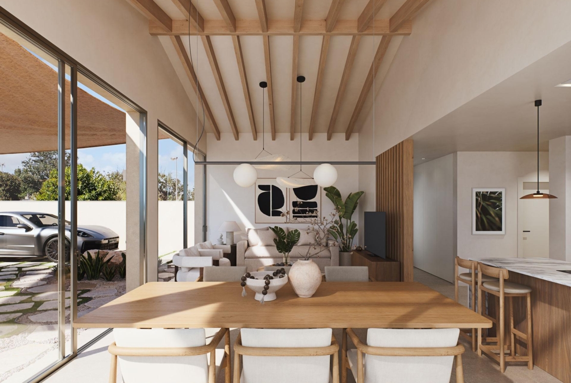 Bright, airy modern villa dining and living area with vaulted ceilings, sleek wood accents, and sliding glass doors in Cabo de Palos.