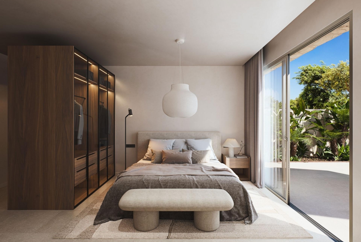 Bright, modern bedroom with plush bedding and glass wardrobe, opening to a private terrace in a luxury villa near Cabo de Palos beach.