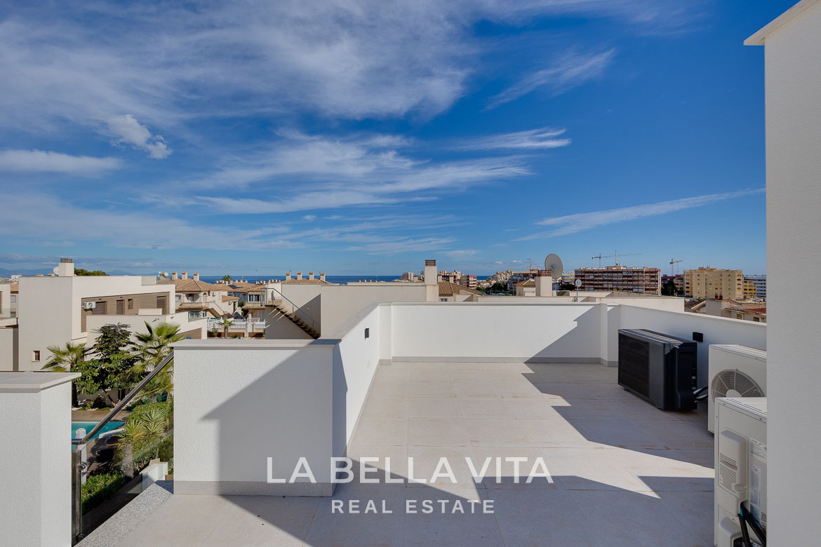 Modern villa with private pool, solarium and basement near La Mata beach, Torrevieja-15 Spacious sun-drenched terrace with panoramic sea views of a key ready 4-bedroom villa in Torreblanca, Torrevieja