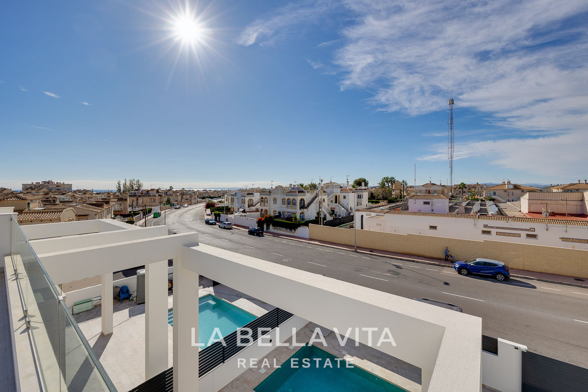 Modern villa with private pool, solarium and basement near La Mata beach, Torrevieja-17 Sun-drenched terrace overlooking the private pool and peaceful streets of a modern 4-bedroom villa in Torreblanca, Torrevieja.