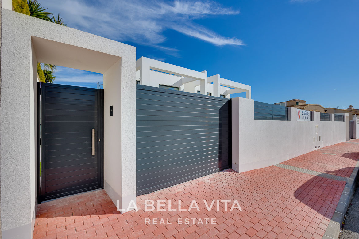 Modern villa with private pool, solarium and basement near La Mata beach, Torrevieja-22 Elegant modern entrance gate of key ready 4-bedroom villa with private pool in Torreblanca, Torrevieja