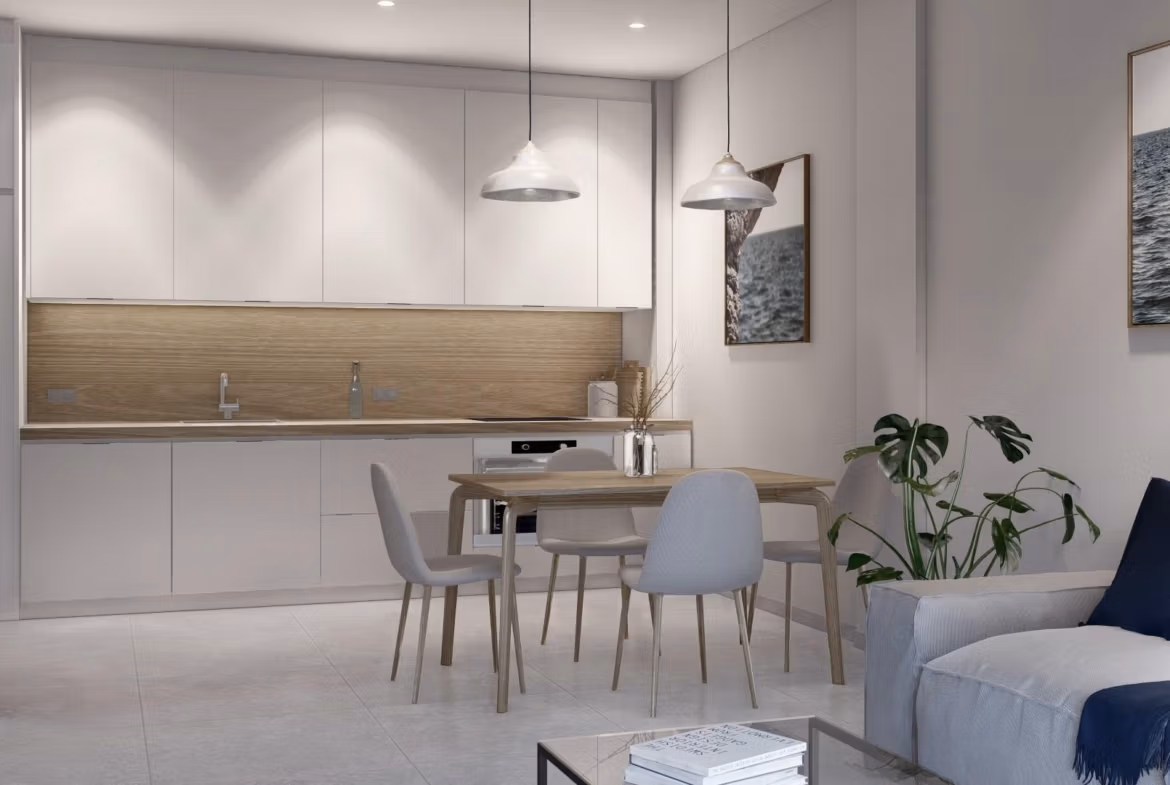 Modern sun-drenched open-plan kitchen and dining area in a new build 3-bedroom apartment in Torre-Pacheco, Murcia.