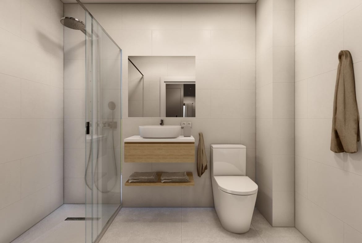 Modern, sleek bathroom with glass shower and elegant fixtures in a new build 3-bedroom apartment in Torre-Pacheco, Murcia.