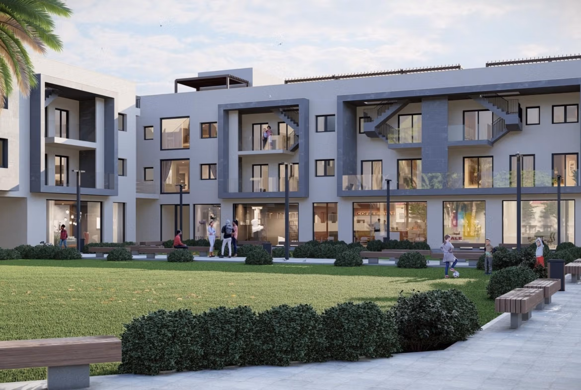 Modern new build 3-bedroom apartment complex in Torre-Pacheco, Murcia, surrounded by landscaped gardens and spacious outdoor seating.