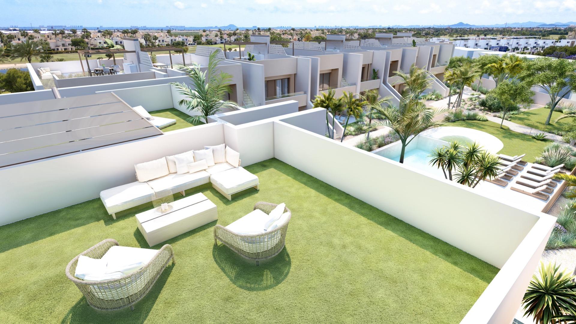 Spacious sun-drenched 90m² solarium terrace with modern outdoor seating at luxury 3-bedroom penthouse in Roda Golf, San Javier.