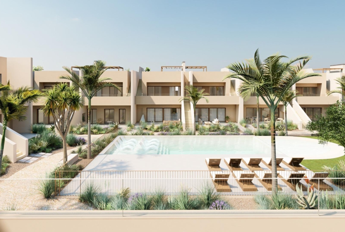Modern 3-bedroom penthouse in Roda Golf, San Javier, featuring a sun-drenched pool area with elegant landscaping and palm trees.