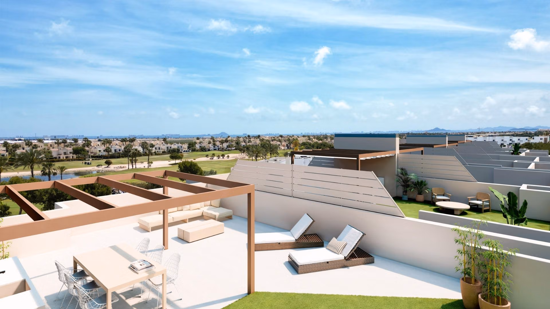 Sun-drenched spacious terrace with modern pergola overlooking landscaped golf course at a new 3-bedroom bungalow in Roda Golf, San Javier.