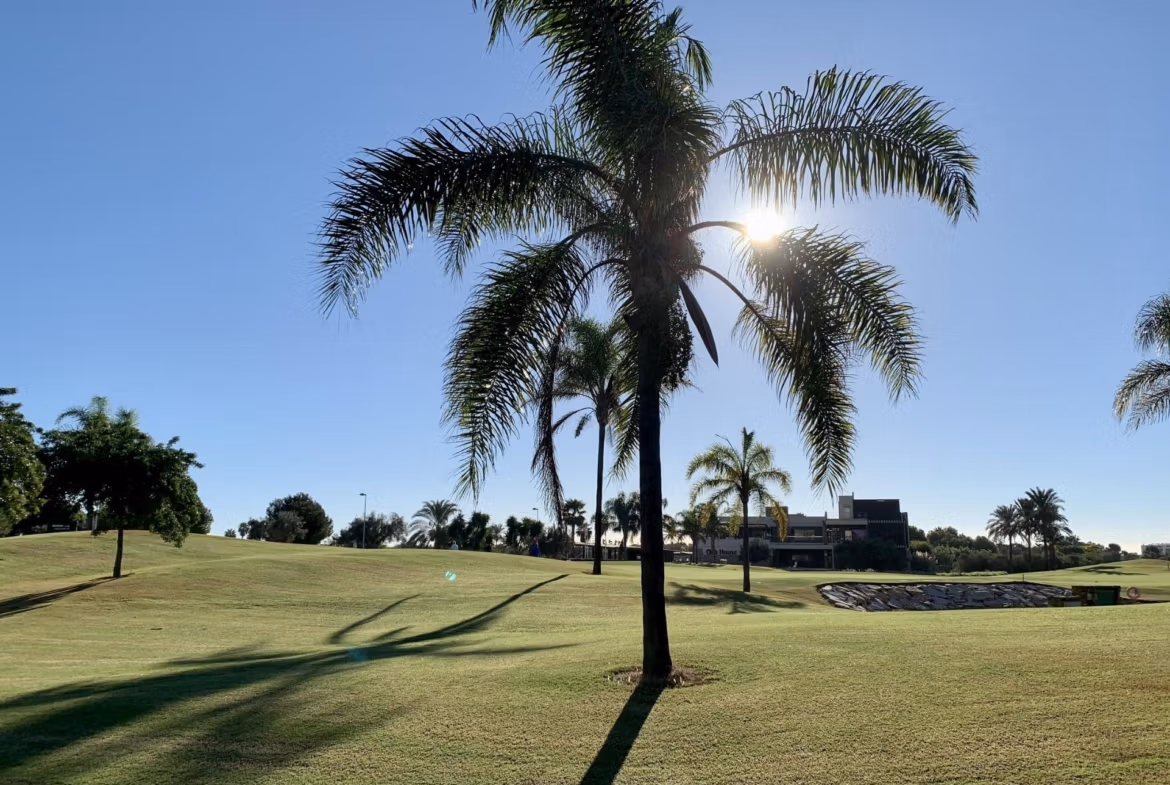 Sunlit lush landscaped garden and golf course surrounding the spacious new build 3-bedroom bungalow in Roda Golf, San Javier.