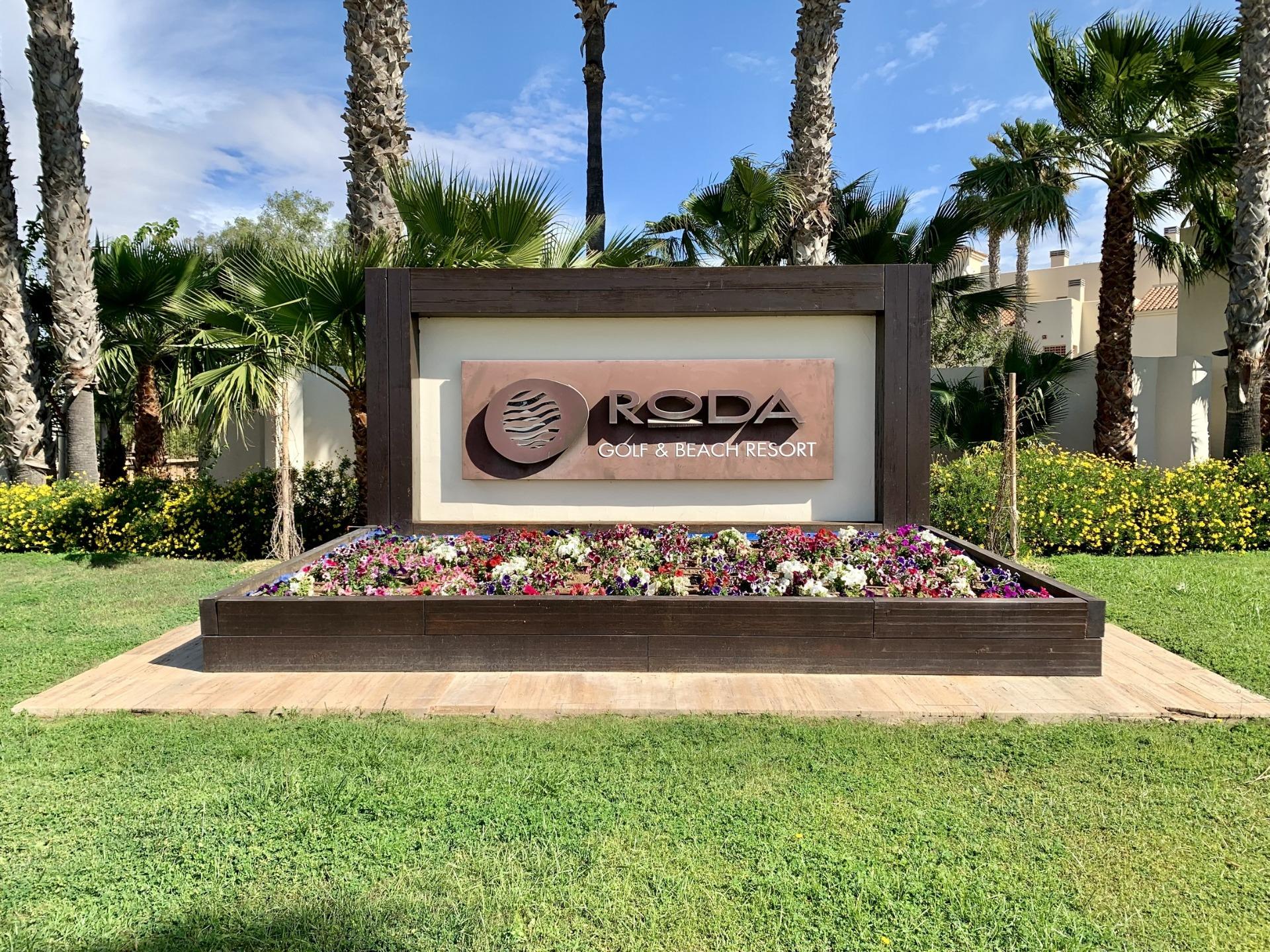 Elegant landscaped entrance sign at prestigious Roda Golf & Beach Resort near San Javier for the modern 3 bedroom penthouse.
