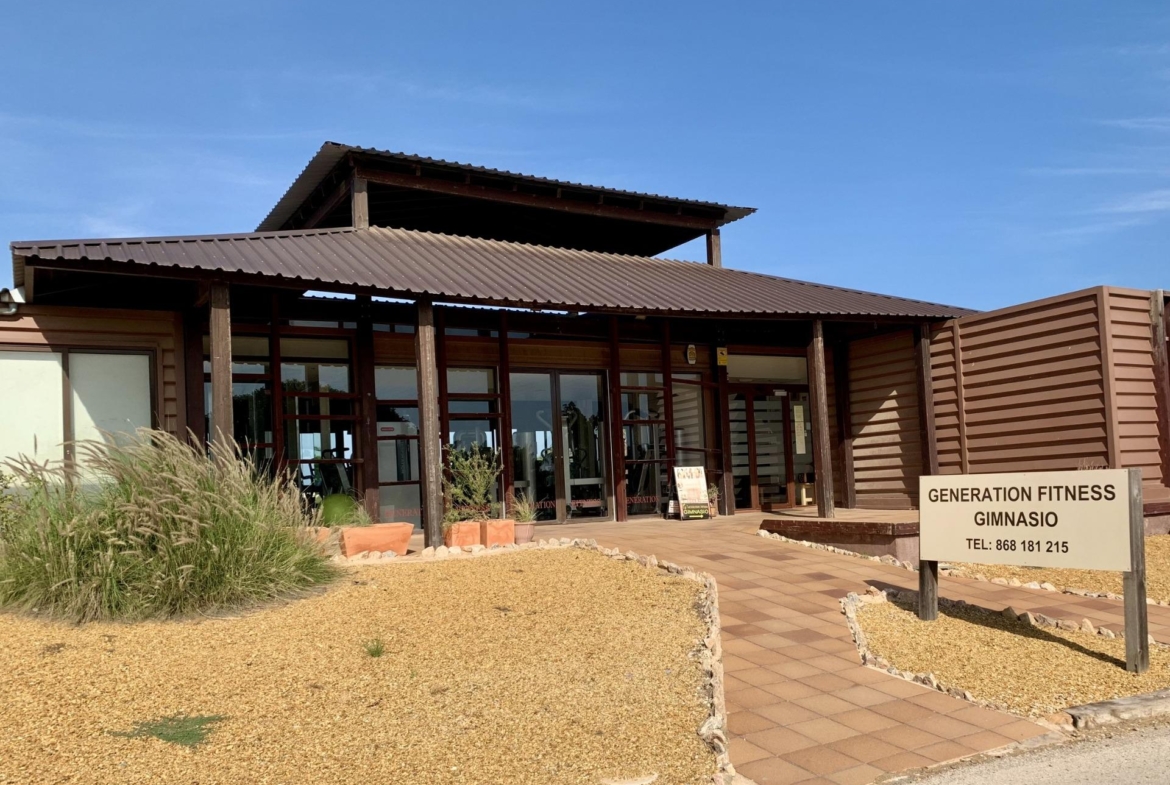 Modern fitness gym exterior with rustic wooden accents near spacious new build 3-bedroom ground floor bungalow in Roda Golf San Javier