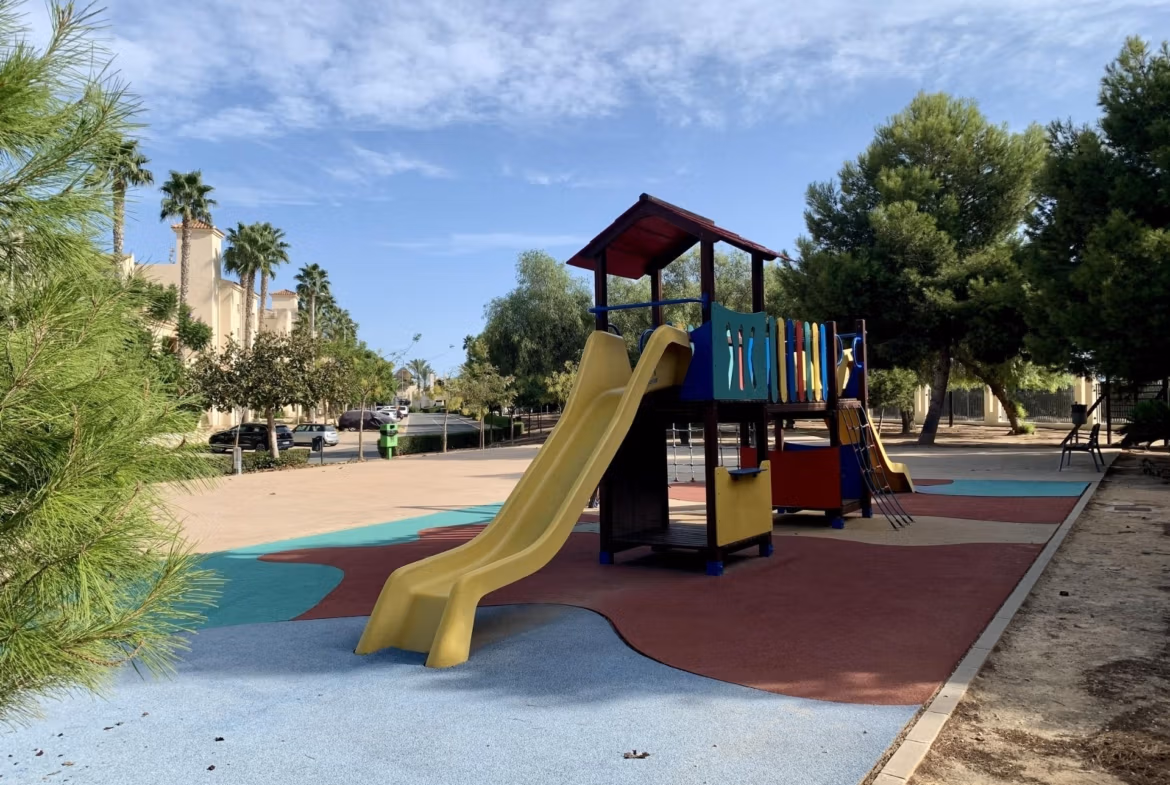 Bright children's playground with slide and climbing structure near spacious new build 3-bedroom bungalow, Roda Golf San Javier