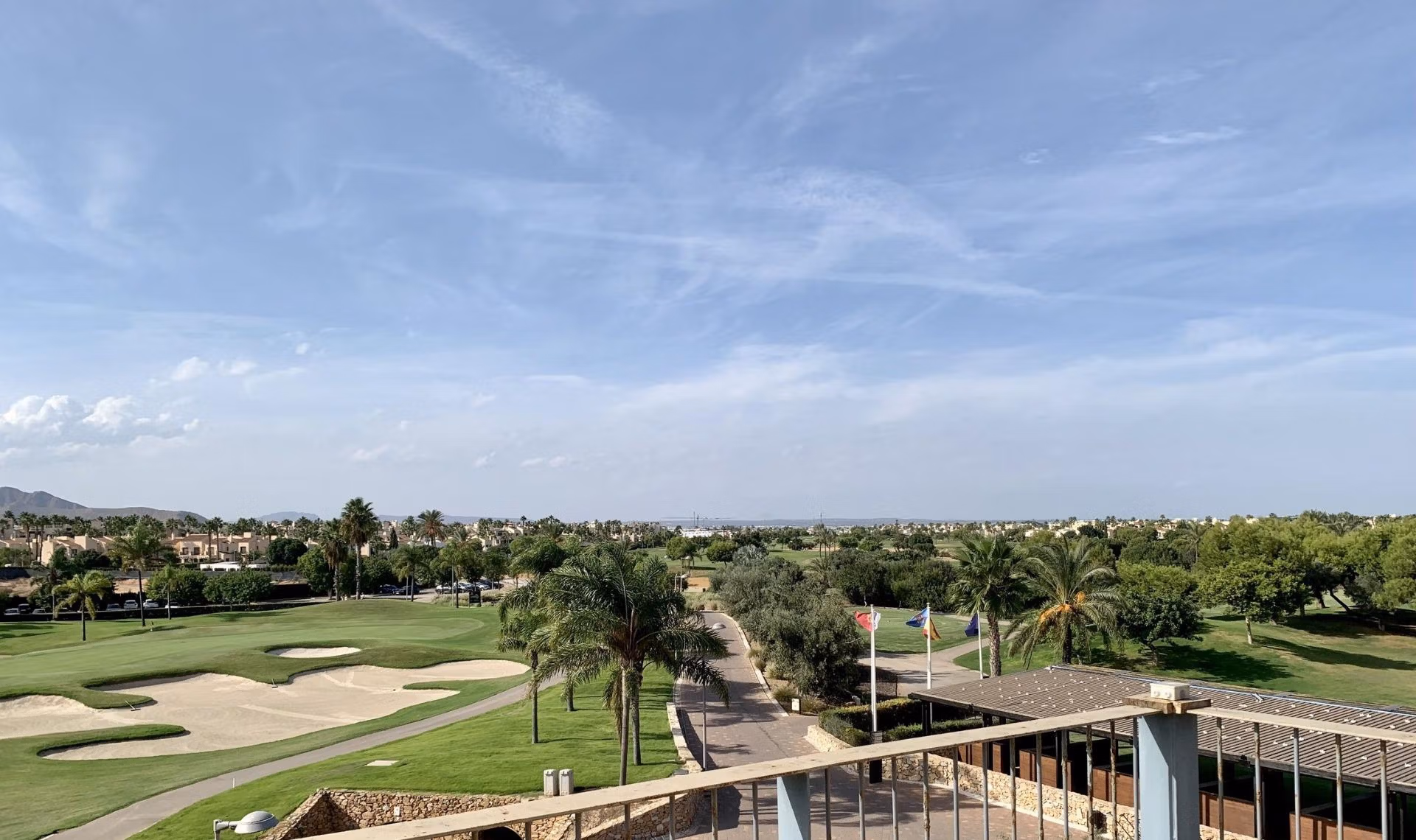 Panoramic view of lush golf course and landscaped greenery from spacious new build 3 bedroom ground floor bungalow in Roda Golf, San Javier