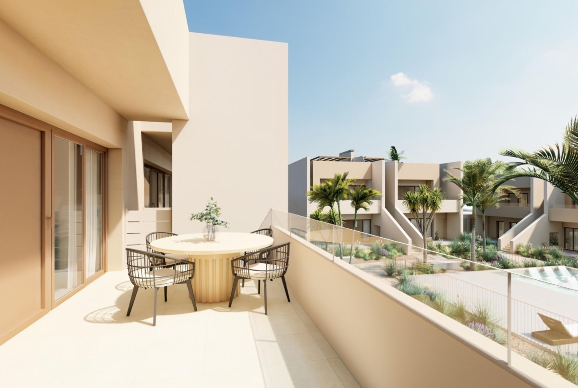 Bright, modern terrace with stylish outdoor seating overlooking landscaped gardens in spacious 3-bedroom ground floor bungalow, Roda Golf San Javier.