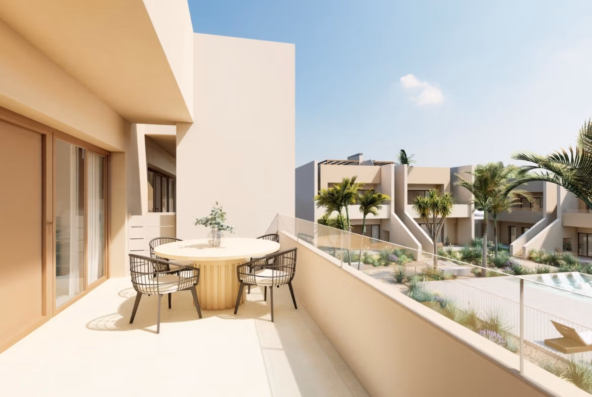 Bright, modern terrace with stylish outdoor seating overlooking landscaped gardens in spacious 3-bedroom ground floor bungalow, Roda Golf San Javier.
