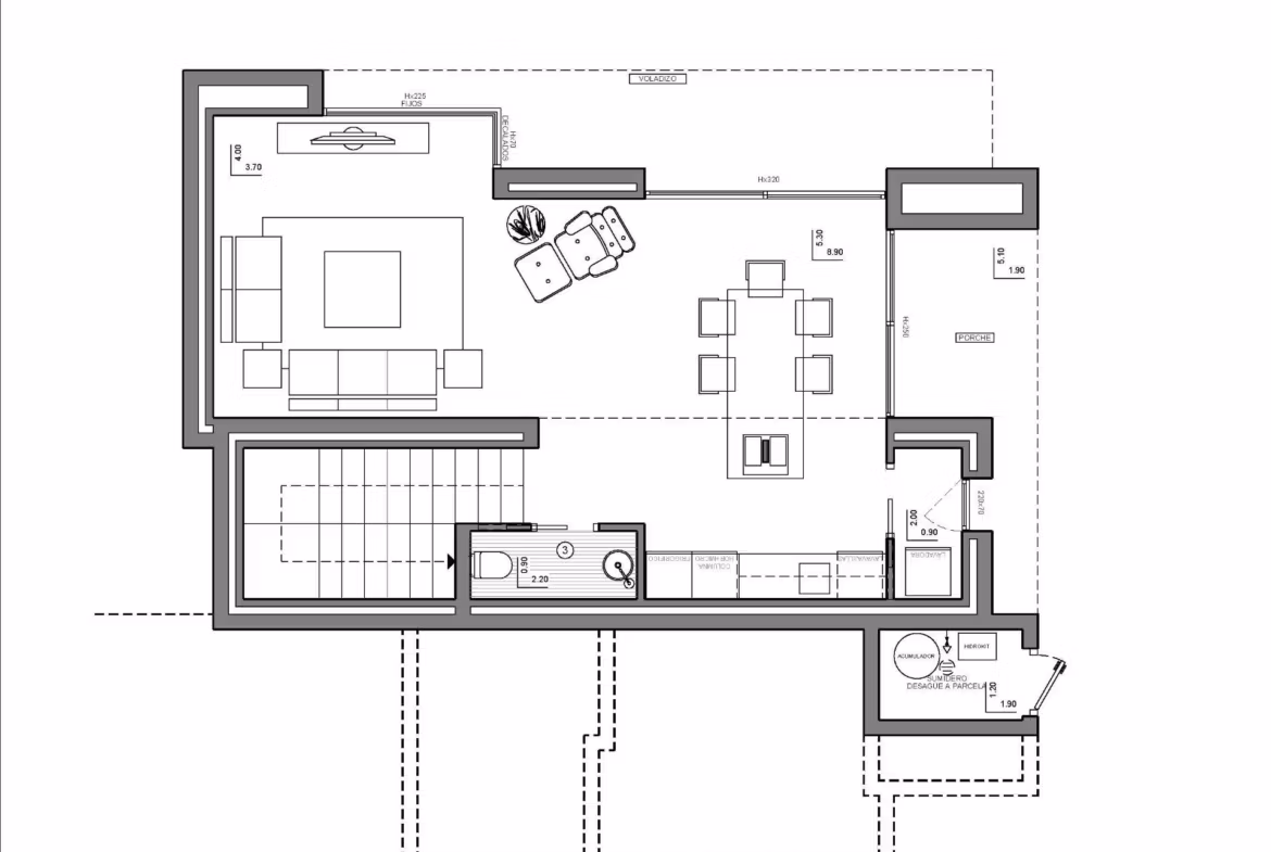 Open-plan modern living and dining area in luxury 2 bedroom villa at Cumbre del Sol with sleek kitchen and spacious layout.