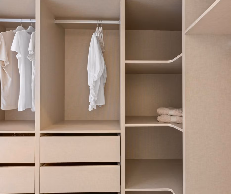Spacious, modern walk-in closet in elevated 2 bedroom penthouse with private solarium in Mar de Cristal.