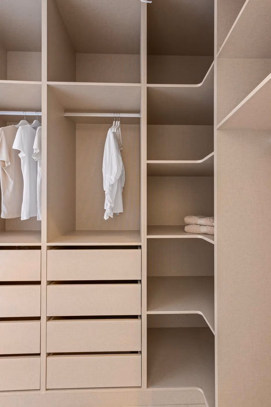 Spacious, modern walk-in closet in elevated 2 bedroom penthouse with private solarium in Mar de Cristal.