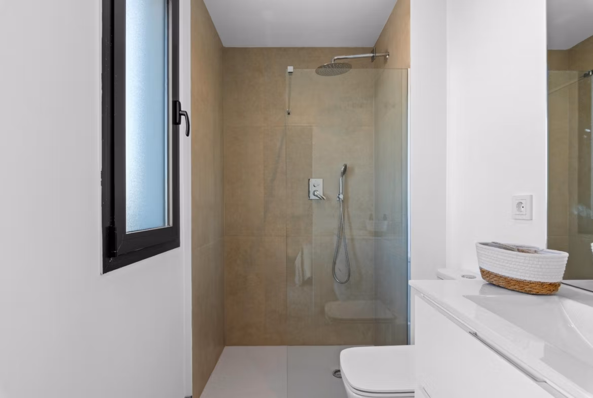 Modern, pristine bathroom with walk-in shower in elevated new build 2 bedroom penthouse in Mar de Cristal