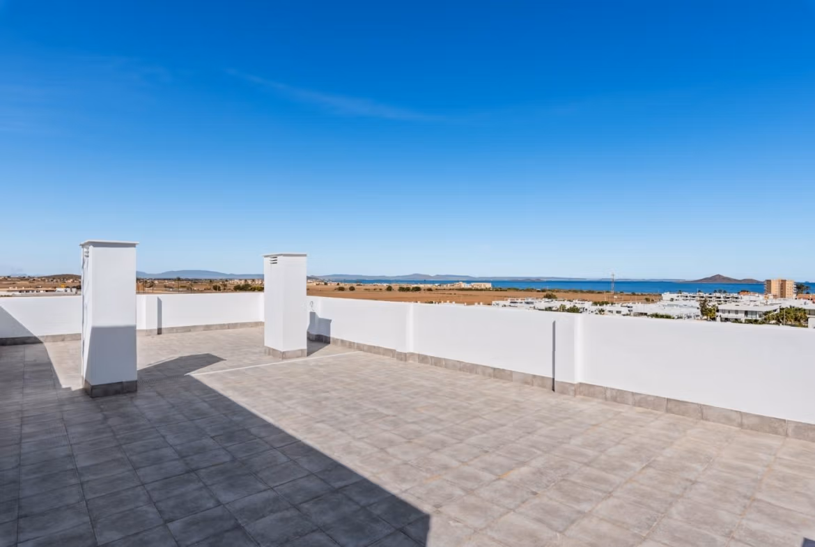 Spacious sun-drenched private solarium terrace with panoramic sea and landscape views in Mar de Cristal penthouse new build