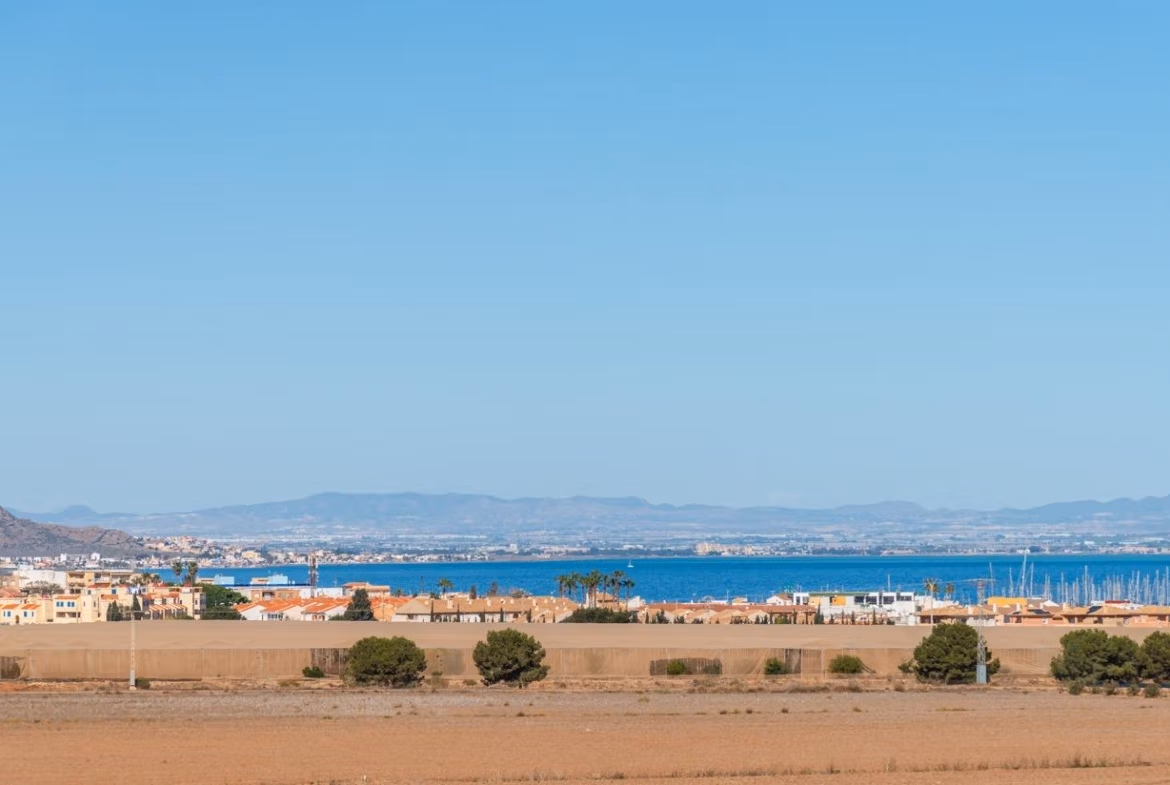 Panoramic sea and marina view from the elevated private solarium of a modern 2-bedroom penthouse in Mar de Cristal.