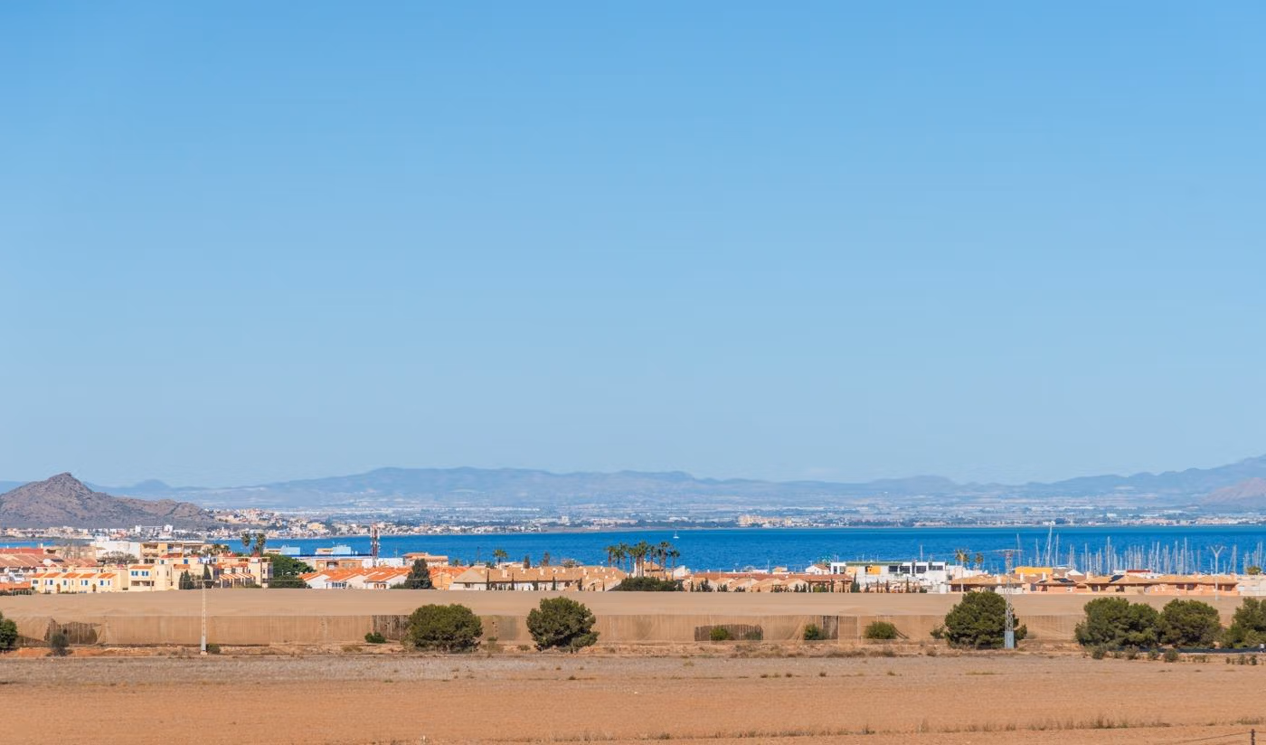 Panoramic sea and marina view from the elevated private solarium of a modern 2-bedroom penthouse in Mar de Cristal.