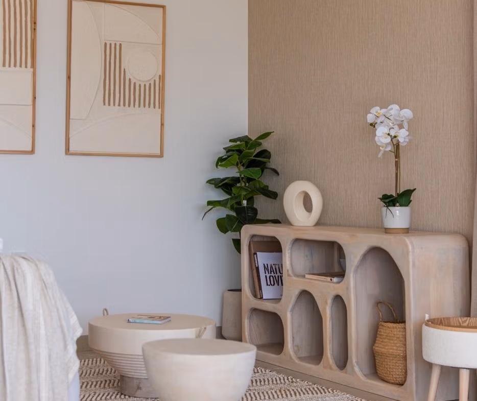 Bright, elegant living area with modern sculptural furniture in a 2-bedroom penthouse in Mar de Cristal.