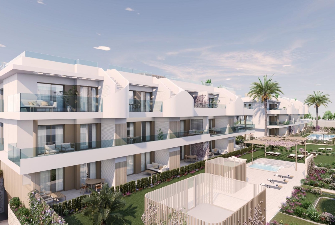 Modern luxury 2 bedroom penthouse in Pilar de la Horadada with spacious terraces, lush landscaping, and a sunlit pool area.
