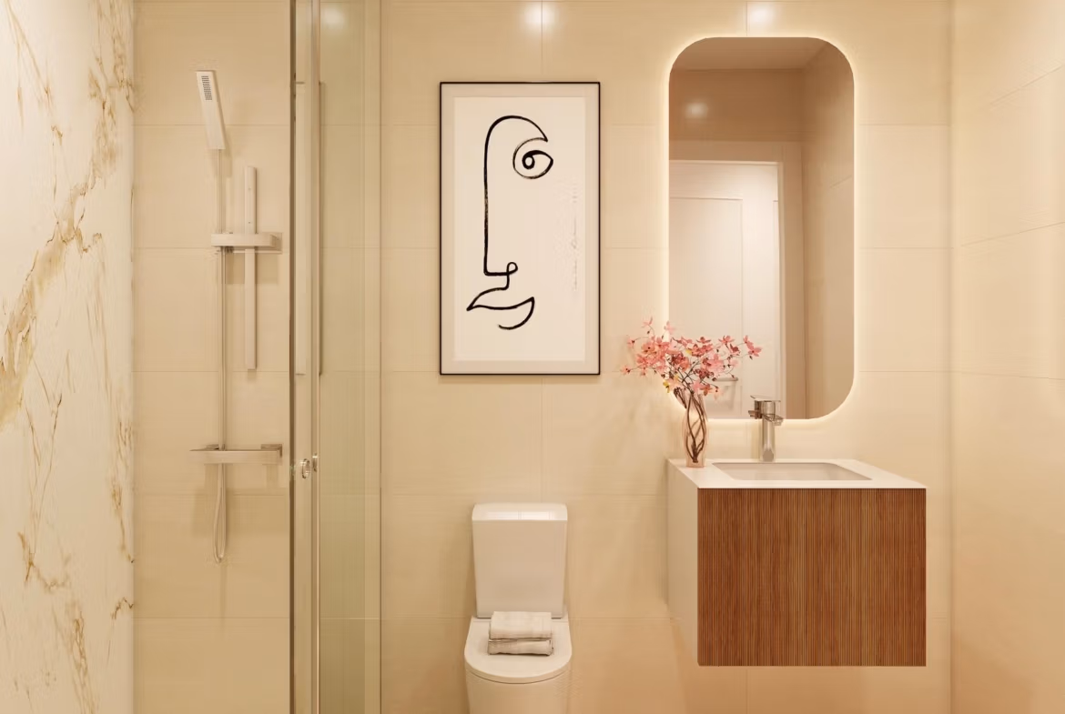 Modern elegant bathroom with glass shower, sleek floating vanity, and artistic decor in spacious Pilar de la Horadada apartment