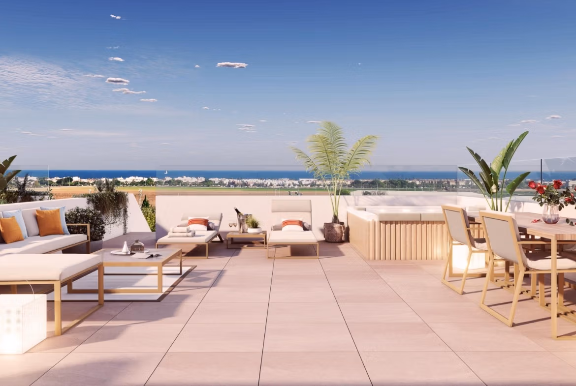 Sun-drenched spacious terrace with modern lounge, dining area, and panoramic sea views in luxury 3-bedroom apartment in Pilar de la Horadada