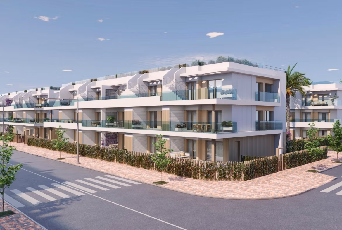Modern spacious 3-bedroom apartment building with glass balconies and landscaped surroundings in Pilar de la Horadada.