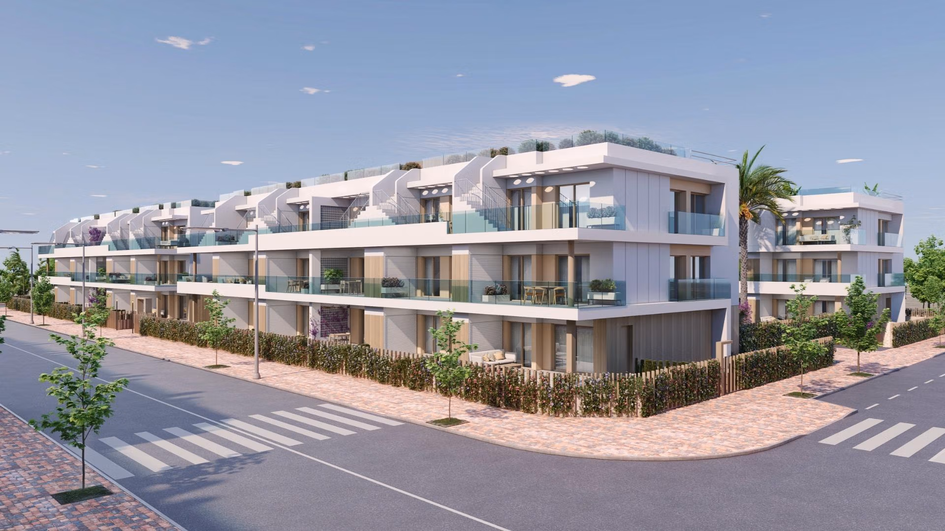 NEW-BUILD-RESIDENTIAL-COMPLEX-IN-PILAR-DE-LA-HORADADA-8 Modern spacious 3-bedroom apartment building with glass balconies and landscaped surroundings in Pilar de la Horadada.